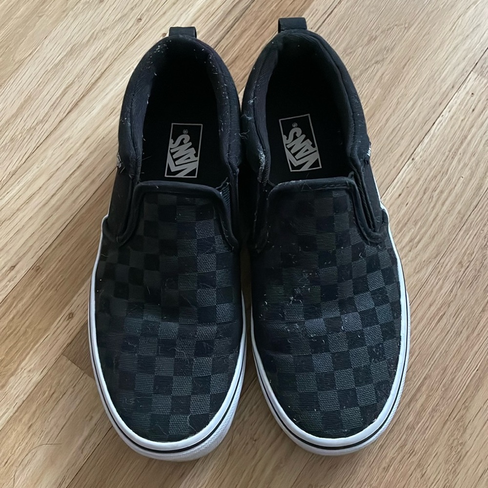 Women’s black checkerboard Vans Size 6